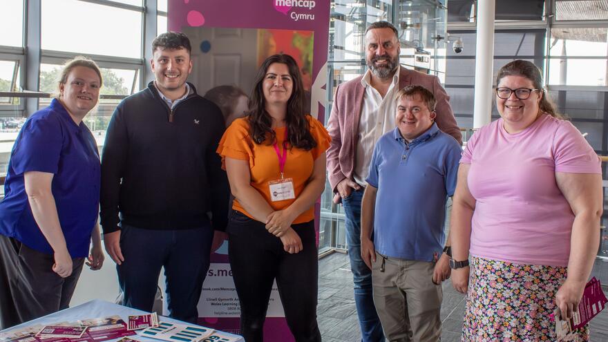 Wales Learning disability helpline volunteers and staff at the Senedd during Learning disability week