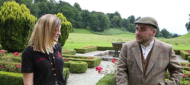 Man and woman stood in National Trust gardens