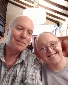 Barry and John on their day out smiling at the camera